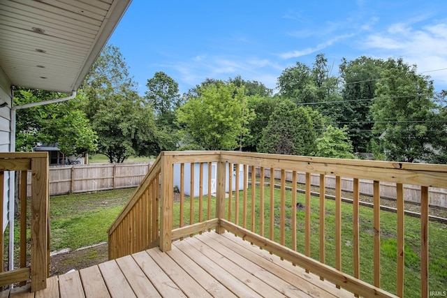 60220 Ruby St, South Bend, IN 46614 - wooden terrace with a fenced backyard