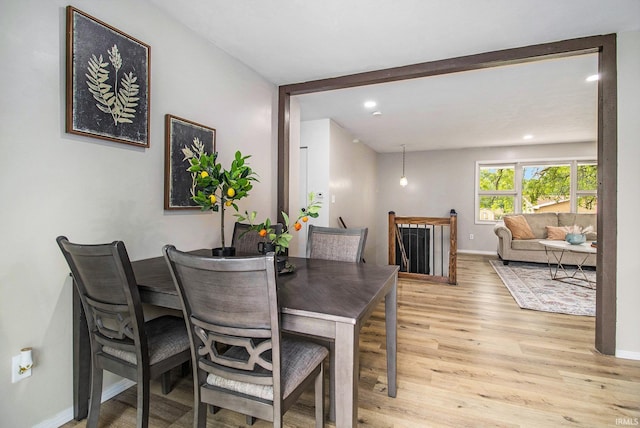 60220 Ruby St, South Bend, IN 46614 - dining space with light wood-style flooring and recessed lighting