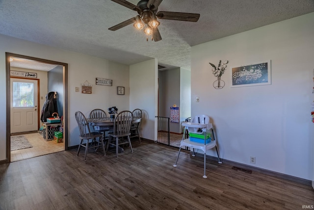 272 Sherman St, Wabash, IN 46992 - dining room featuring a textured ceiling, wood finished floors, and ceiling fan