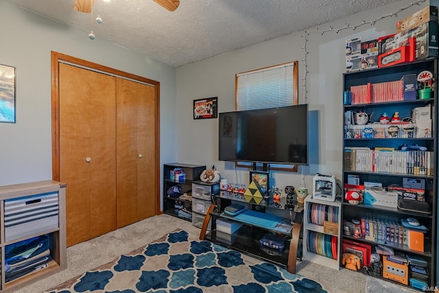 272 Sherman St, Wabash, IN 46992 - recreation room featuring carpet flooring, a textured ceiling, and ceiling fan