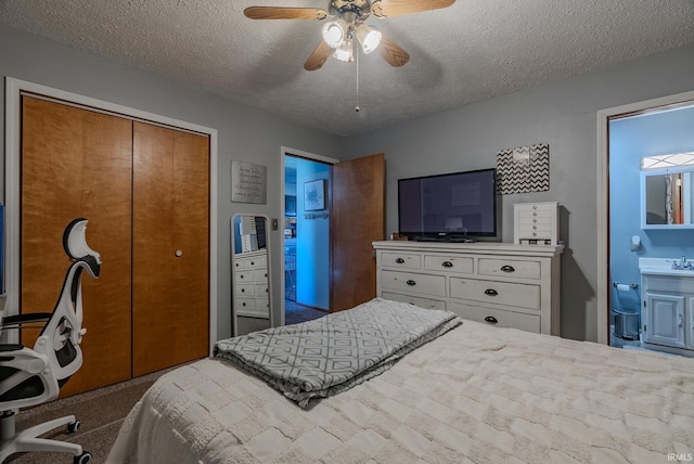 272 Sherman St, Wabash, IN 46992 - bedroom featuring a textured ceiling, a closet, and a ceiling fan
