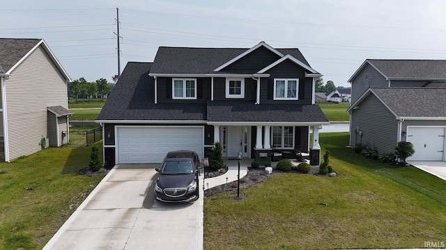 13710 Copper Strike Pass, Fort Wayne, IN 46845 - craftsman inspired home featuring covered porch, driveway, a front lawn, and roof with shingles