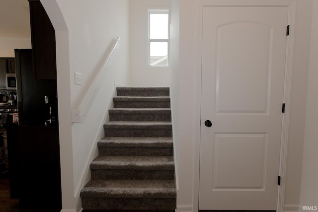 13710 Copper Strike Pass, Fort Wayne, IN 46845 - staircase with arched walkways