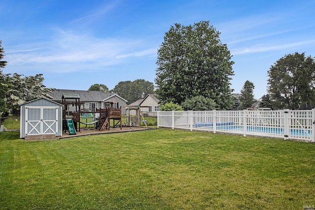55887 Wild Game Dr, Osceola, IN 46561 - view of yard featuring a playground and a storage unit