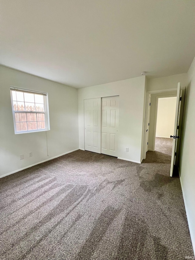 2927 Barnhart Ave, Fort Wayne, IN 46805 - unfurnished bedroom with carpet flooring and a closet
