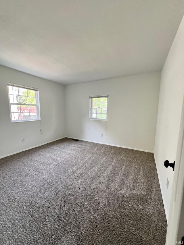 2927 Barnhart Ave, Fort Wayne, IN 46805 - spare room featuring carpet flooring