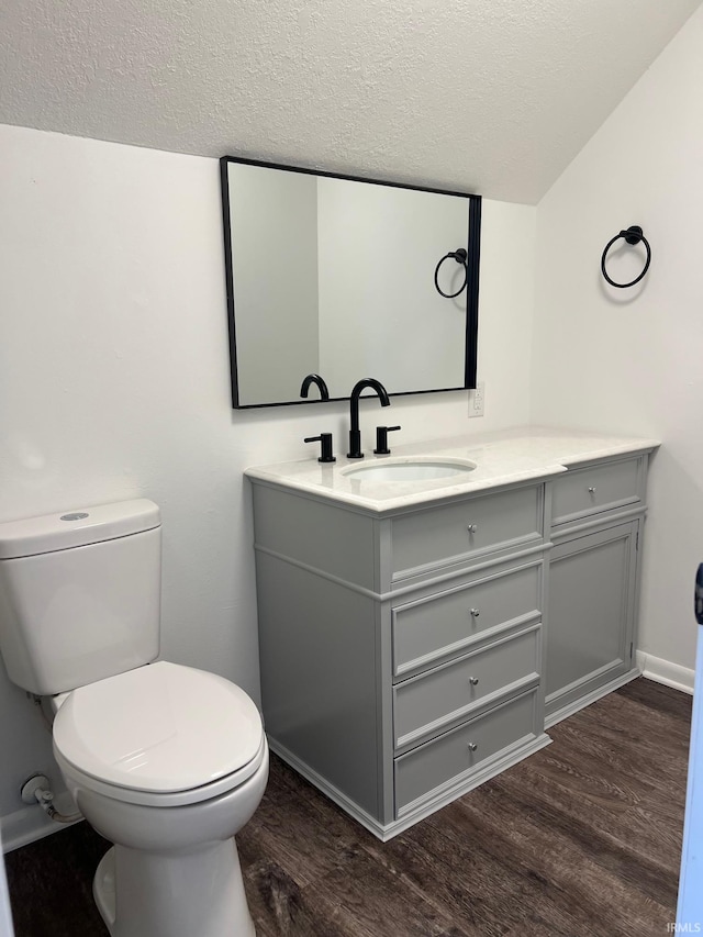 2927 Barnhart Ave, Fort Wayne, IN 46805 - bathroom with vanity, a textured ceiling, and wood finished floors