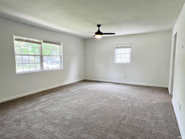 2927 Barnhart Ave, Fort Wayne, IN 46805 - carpeted empty room featuring a ceiling fan and baseboards