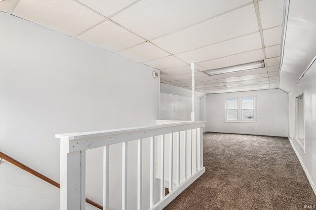 429 S Edison Ave, South Bend, IN 46619 - hallway featuring carpet, a paneled ceiling, and an upstairs landing