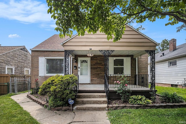 429 S Edison Ave, South Bend, IN 46619 - view of front of house with a porch and stone siding