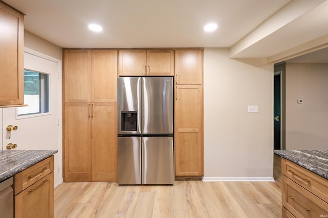 5219 Forest Grove Dr, Fort Wayne, IN 46835 - kitchen with stainless steel refrigerator with ice dispenser, light wood-type flooring, dark stone counters, and recessed lighting