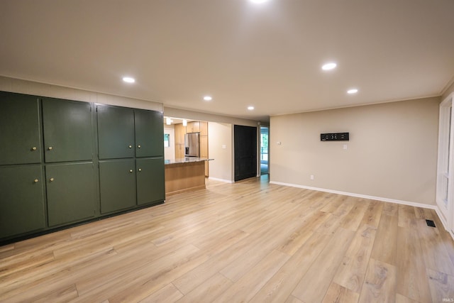 5219 Forest Grove Dr, Fort Wayne, IN 46835 - unfurnished living room with light wood finished floors and recessed lighting
