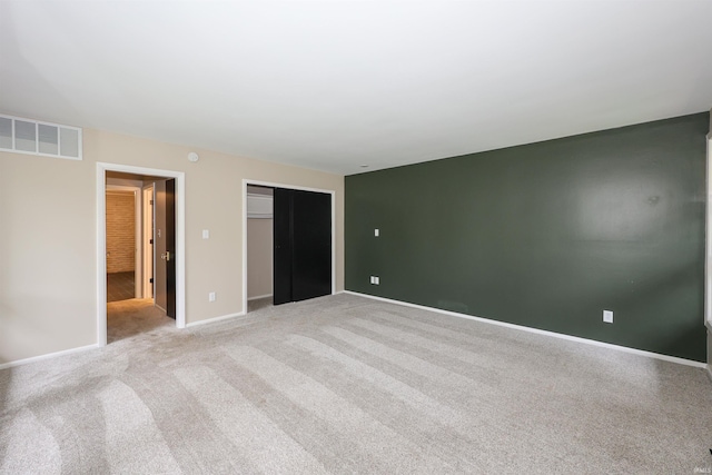 5219 Forest Grove Dr, Fort Wayne, IN 46835 - unfurnished bedroom with light colored carpet and a closet