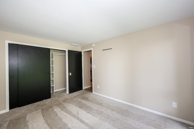 5219 Forest Grove Dr, Fort Wayne, IN 46835 - unfurnished bedroom with a closet and carpet flooring