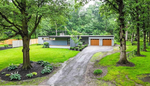 5219 Forest Grove Dr, Fort Wayne, IN 46835 - mid-century inspired home with driveway and a garage