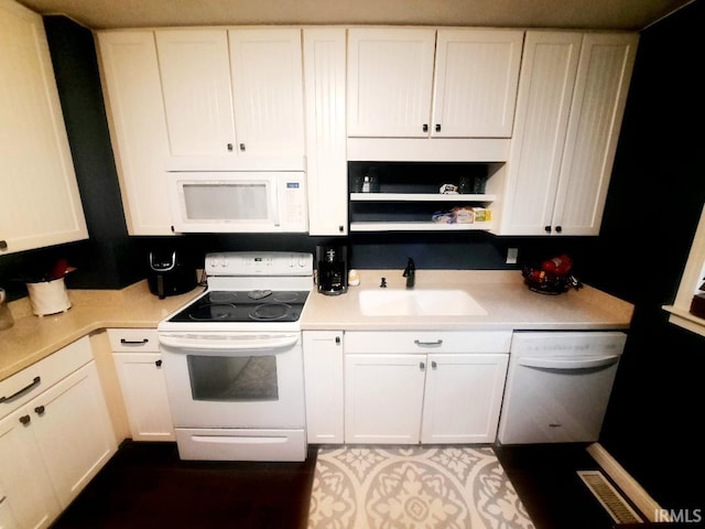 2629 S Meeker Ave, Muncie, IN 47302 - kitchen featuring white appliances, open shelves, white cabinets, and light countertops