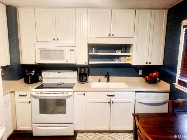 2629 S Meeker Ave, Muncie, IN 47302 - kitchen with white appliances, white cabinetry, and light countertops