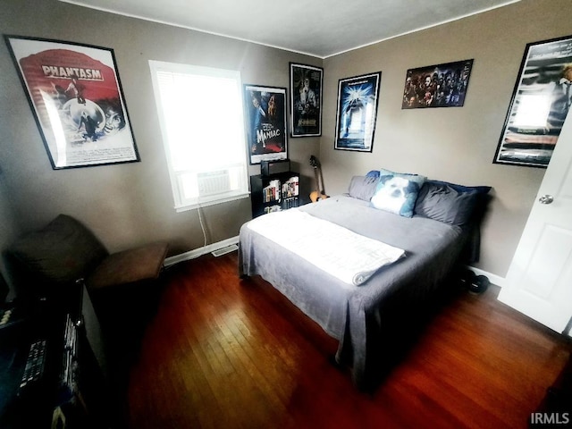 2629 S Meeker Ave, Muncie, IN 47302 - bedroom featuring wood finished floors and baseboards