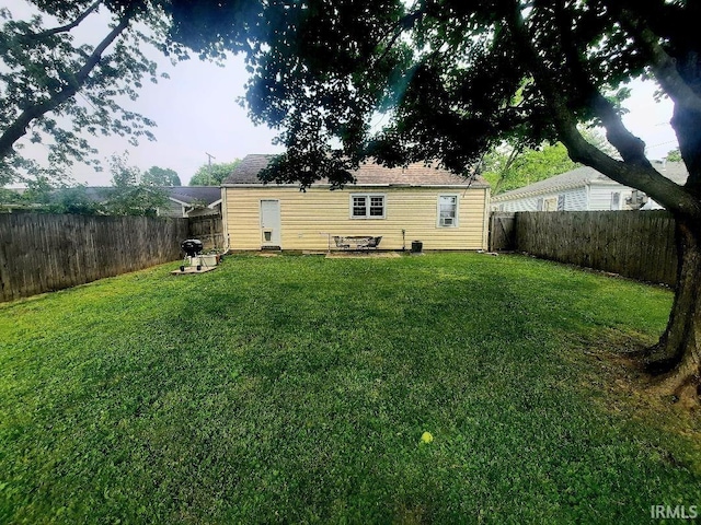 2629 S Meeker Ave, Muncie, IN 47302 - back of house featuring a fenced backyard