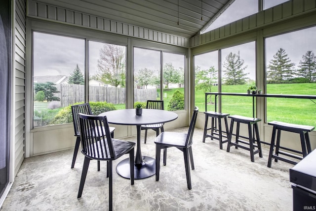 8005 Mackinac Cv, Fort Wayne, IN 46835 - sunroom featuring outdoor dining area and lofted ceiling