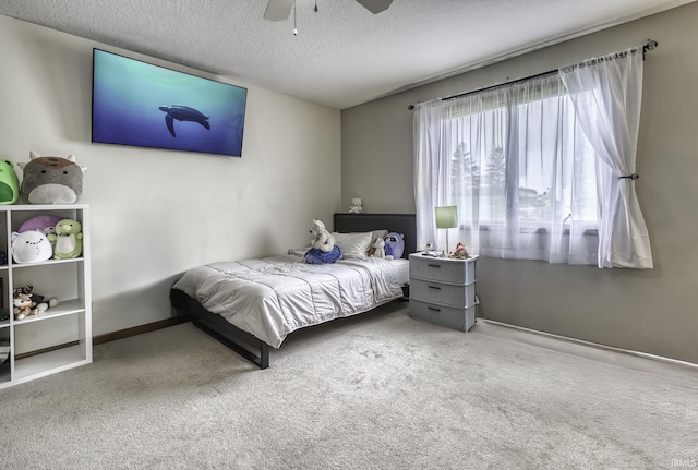 8005 Mackinac Cv, Fort Wayne, IN 46835 - bedroom featuring carpet, a textured ceiling, and a ceiling fan