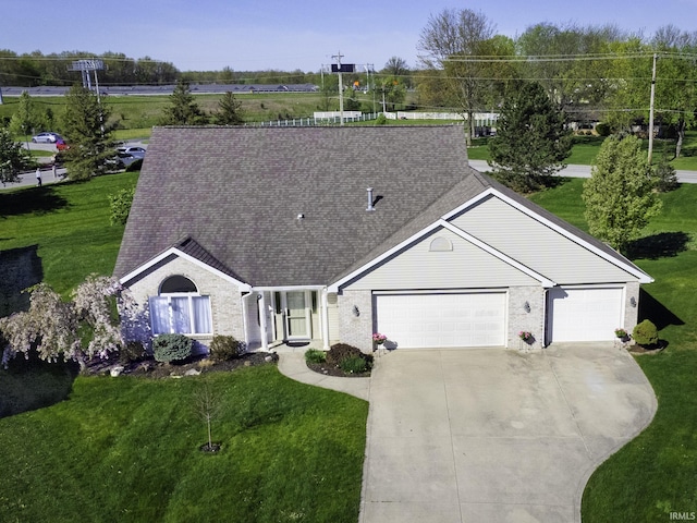 8005 Mackinac Cv, Fort Wayne, IN 46835 - ranch-style house featuring an attached garage, concrete driveway, and a front lawn