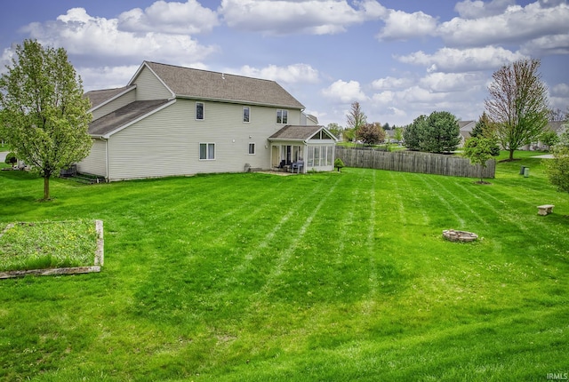 8005 Mackinac Cv, Fort Wayne, IN 46835 - rear view of property featuring a patio and a sunroom