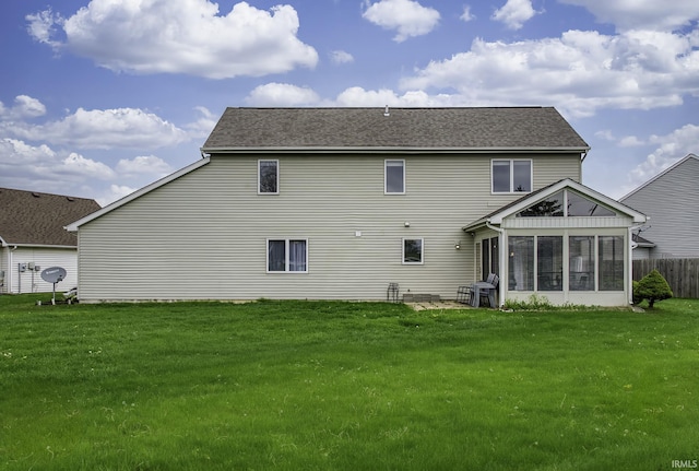 8005 Mackinac Cv, Fort Wayne, IN 46835 - back of property featuring a sunroom and roof with shingles