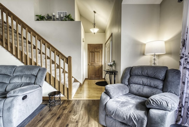 8005 Mackinac Cv, Fort Wayne, IN 46835 - foyer entrance featuring stairway, wood finished floors, and high vaulted ceiling