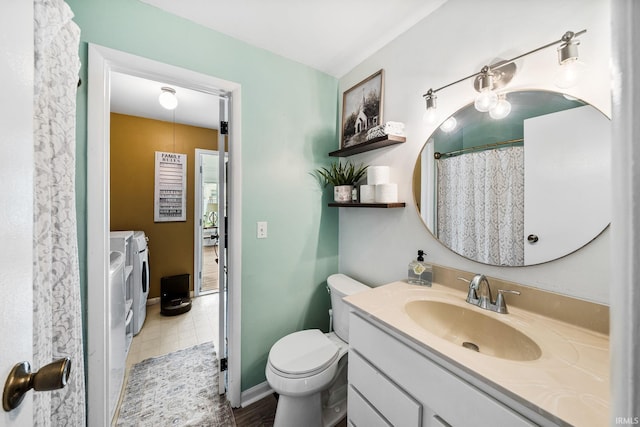 3822 Eastmont Dr, South Bend, IN 46628 - bathroom with separate washer and dryer and vanity