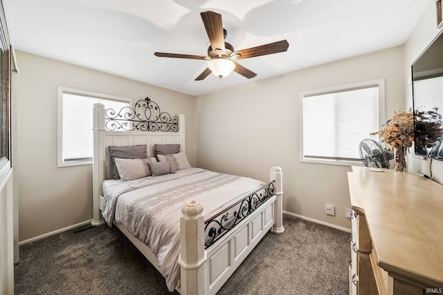3822 Eastmont Dr, South Bend, IN 46628 - bedroom with dark carpet and ceiling fan