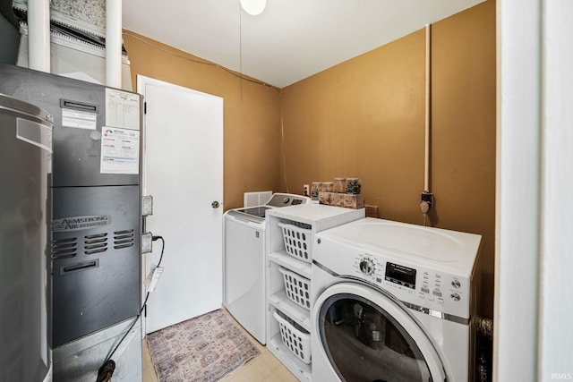 3822 Eastmont Dr, South Bend, IN 46628 - washroom with washing machine and clothes dryer and heating unit