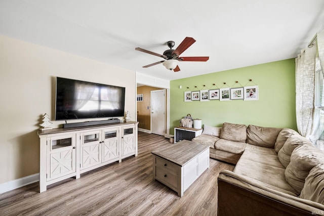 3822 Eastmont Dr, South Bend, IN 46628 - living room with light wood-style floors and a ceiling fan