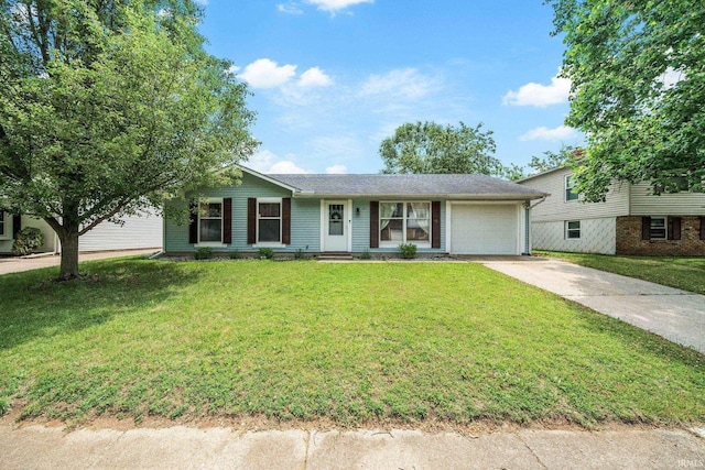 3822 Eastmont Dr, South Bend, IN 46628 - view of front of property featuring concrete driveway, a garage, and a front lawn