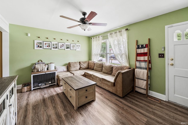 3822 Eastmont Dr, South Bend, IN 46628 - living room featuring healthy amount of natural light, dark wood-style flooring, and ceiling fan