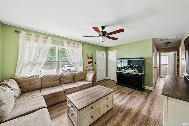 3822 Eastmont Dr, South Bend, IN 46628 - living area with wood finished floors and ceiling fan