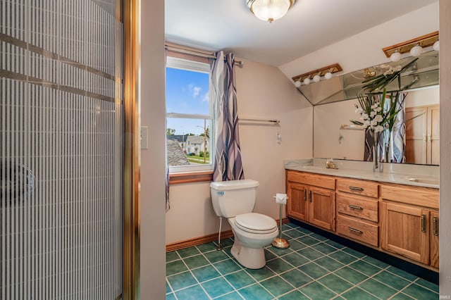 1209 S Jackson St, Auburn, IN 46706 - bathroom featuring a heating unit, double vanity, tile patterned floors, and lofted ceiling