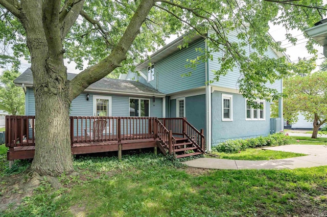 1209 S Jackson St, Auburn, IN 46706 - back of property featuring a wooden deck and a lawn