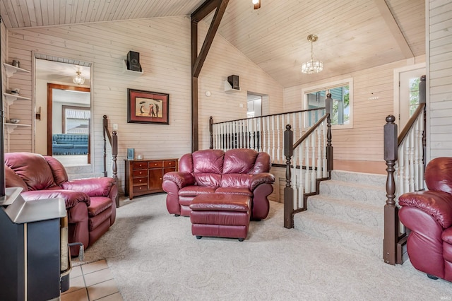 1209 S Jackson St, Auburn, IN 46706 - living area featuring vaulted ceiling, wood walls, wood ceiling, a chandelier, and light colored carpet