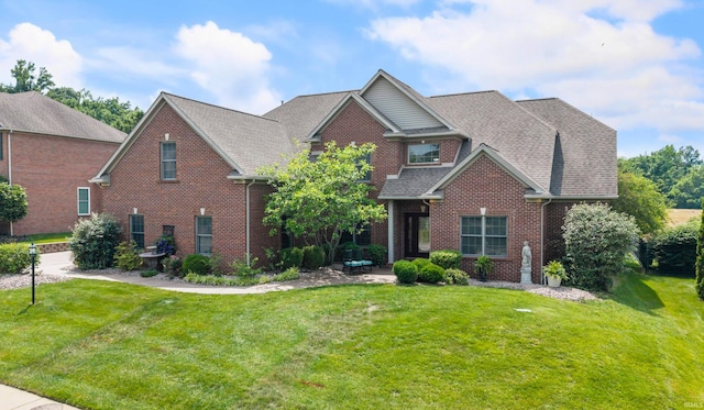 4525 Estate Dr, Newburgh, IN 47630 - view of front of property featuring brick siding, a front yard, and a patio