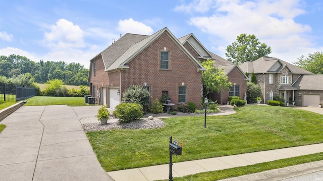 4525 Estate Dr, Newburgh, IN 47630 - traditional home with concrete driveway, brick siding, and an attached garage