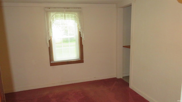 142 W Howard St, Galveston, IN 46932 - carpeted empty room featuring baseboards