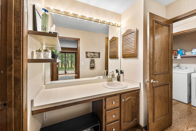 10880 Cougar Dr, Granger, IN 46530 - bathroom with separate washer and dryer and vanity