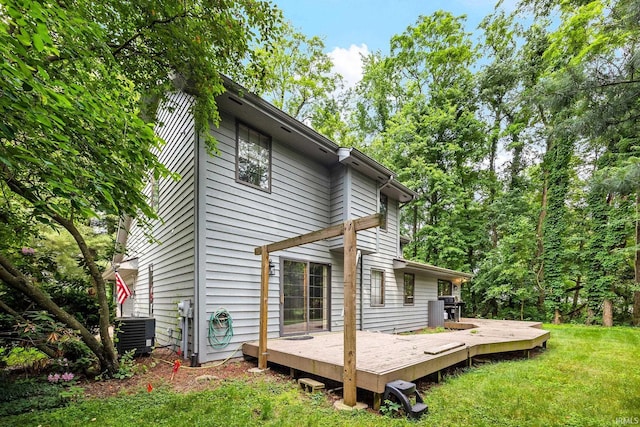 10880 Cougar Dr, Granger, IN 46530 - rear view of property featuring a yard and a wooden deck