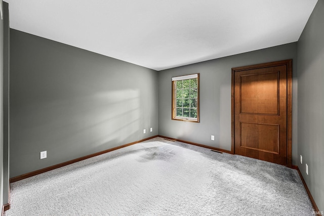 10880 Cougar Dr, Granger, IN 46530 - unfurnished room featuring baseboards and carpet floors