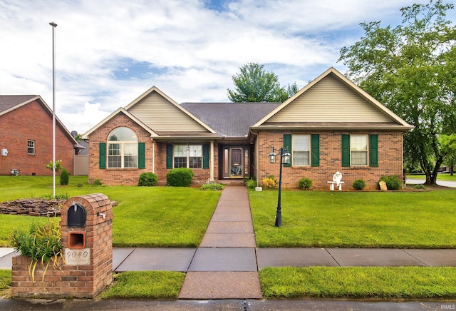 9040 Clear Creek Dr, Evansville, IN 47711 - ranch-style home with a front yard and brick siding