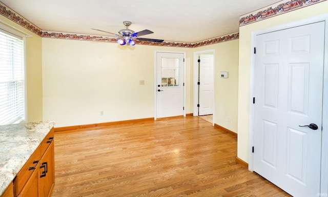 9040 Clear Creek Dr, Evansville, IN 47711 - unfurnished room featuring a ceiling fan and light wood-style flooring