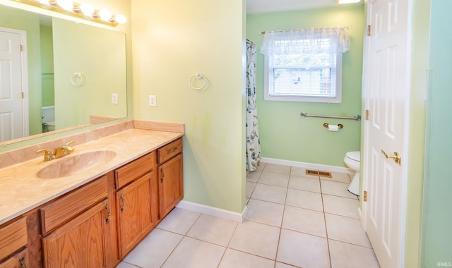 9040 Clear Creek Dr, Evansville, IN 47711 - bathroom featuring vanity and tile patterned flooring