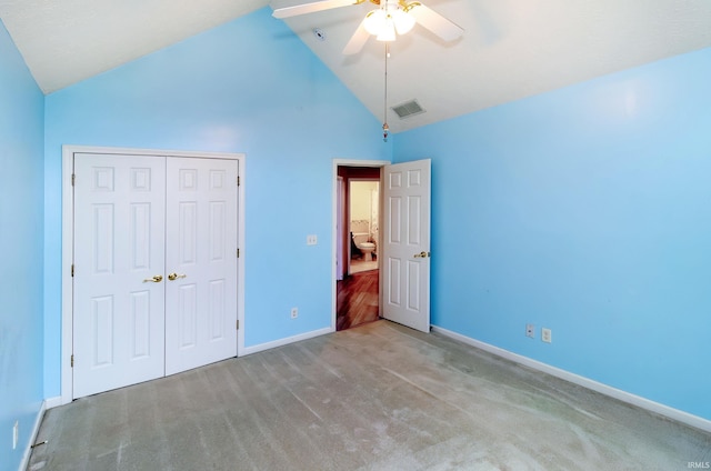 9040 Clear Creek Dr, Evansville, IN 47711 - unfurnished bedroom featuring carpet, a closet, high vaulted ceiling, and a ceiling fan