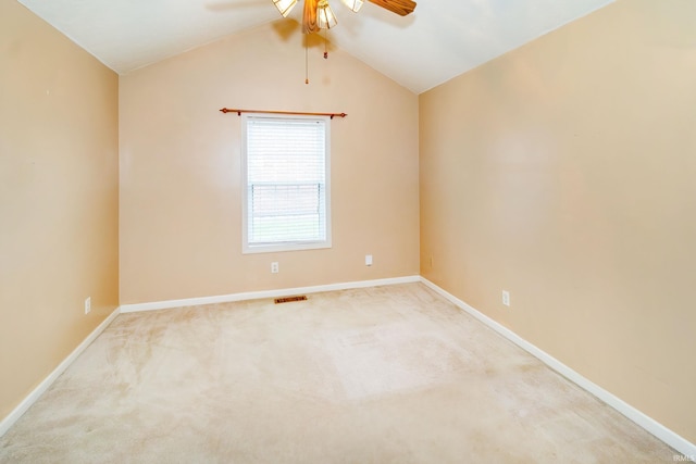 9040 Clear Creek Dr, Evansville, IN 47711 - empty room featuring ceiling fan, vaulted ceiling, and carpet floors